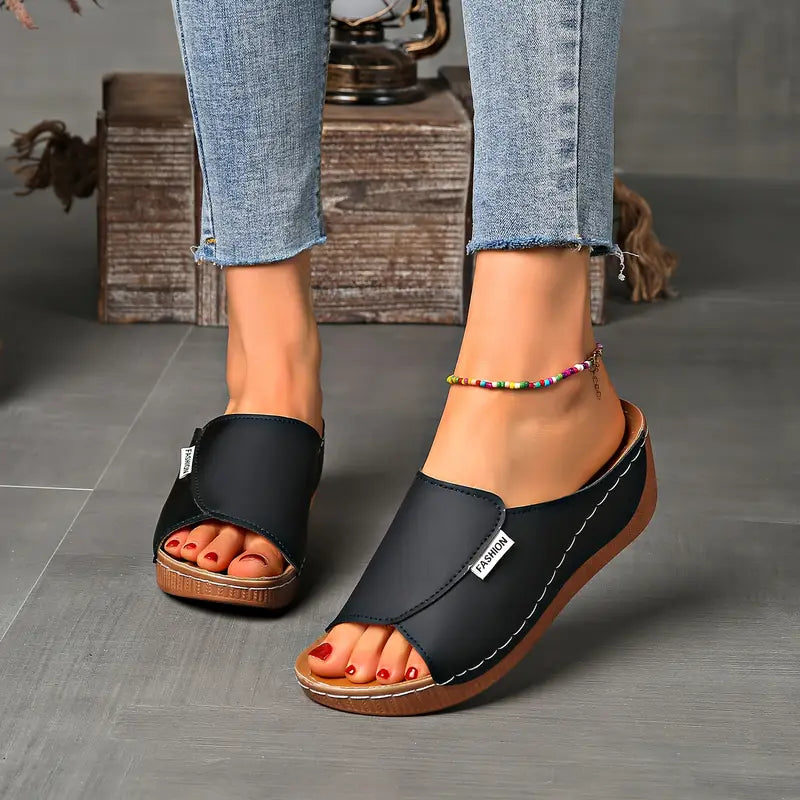 Sandalias ergonómicas negras, vista lateral